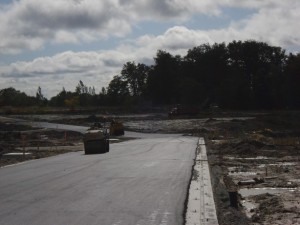 A newly graded subdivision road at base course stage
